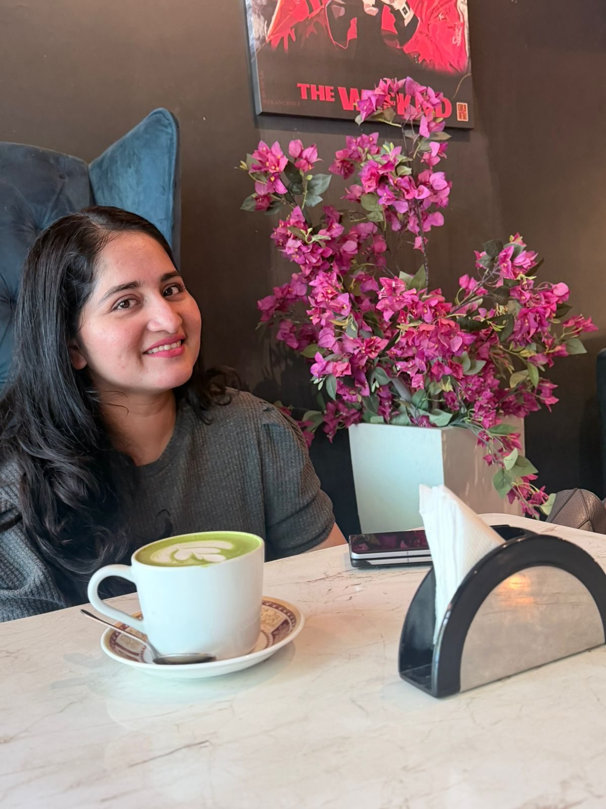 A guest enjoying coffee in the lounge at Panache